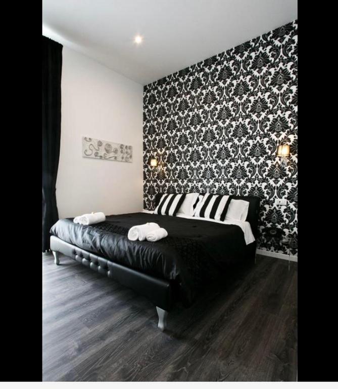 Posteľ alebo postele v izbe v ubytovaní Rome Key Home