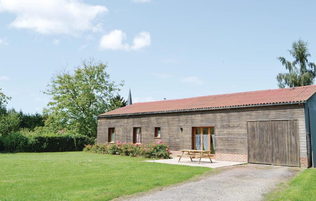 a barn with a picnic table in front of it at Awesome Home In Gueschart With 2 Bedrooms And Wifi in Gueschart