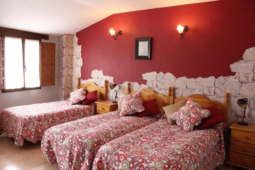 Postel nebo postele na pokoji v ubytování Pozolico Hotel Rural