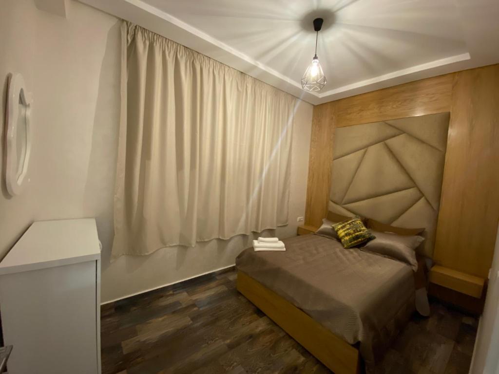 Tempat tidur dalam kamar di LA CASA DEL SOL IMSOUANE