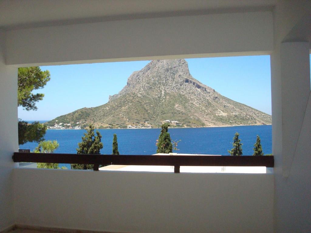 a view of a mountain from a window at Pegasus in Masouri