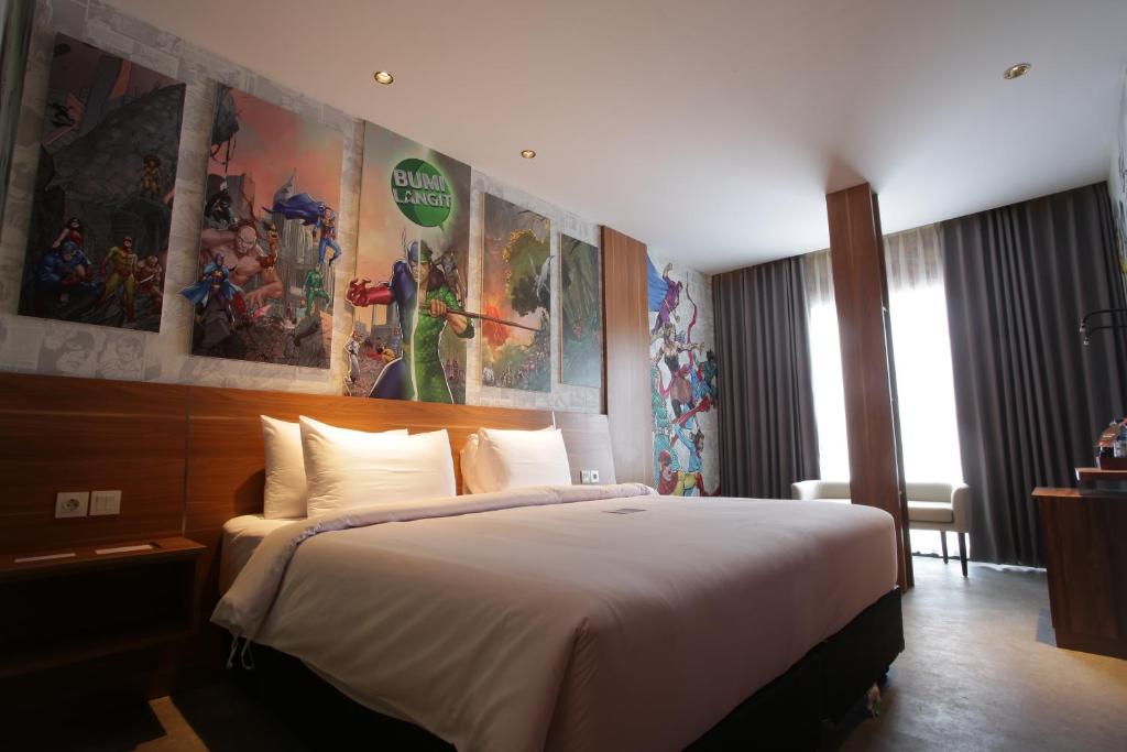 Postel nebo postele na pokoji v ubytování Creative Restart Hotel - CARTEL Bandung