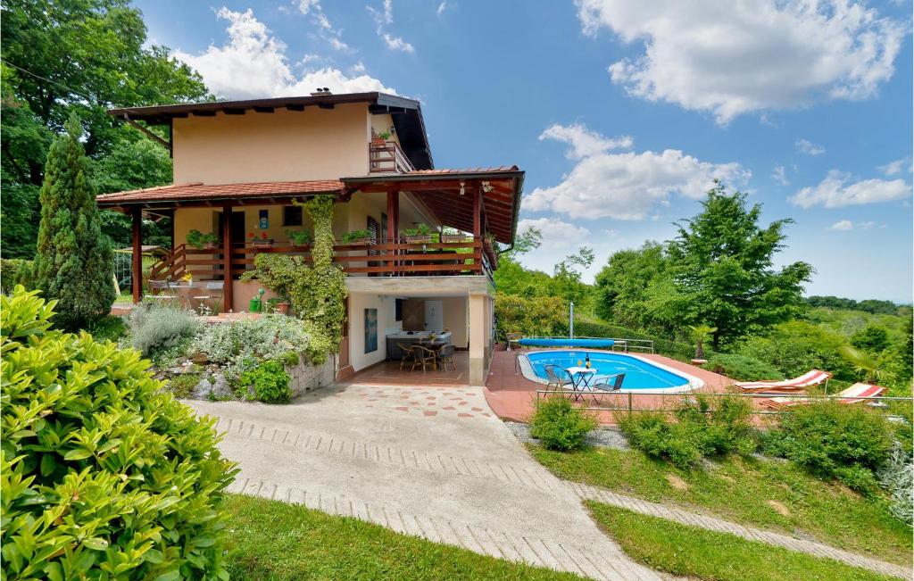 a villa with a swimming pool and a house at Nice Home In Petrinja With House A Panoramic View in Petrinja