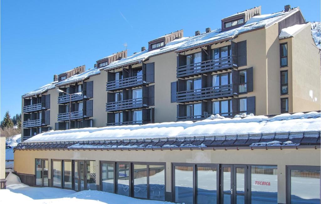 a building with snow on top of it at Awesome Apartment In Vason With 3 Bedrooms in Vason