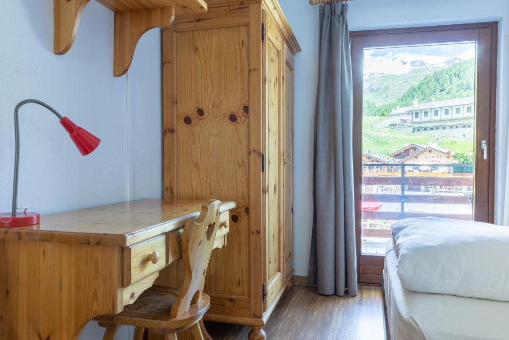 Postel nebo postele na pokoji v ubytování Hotel Meuble' Joli