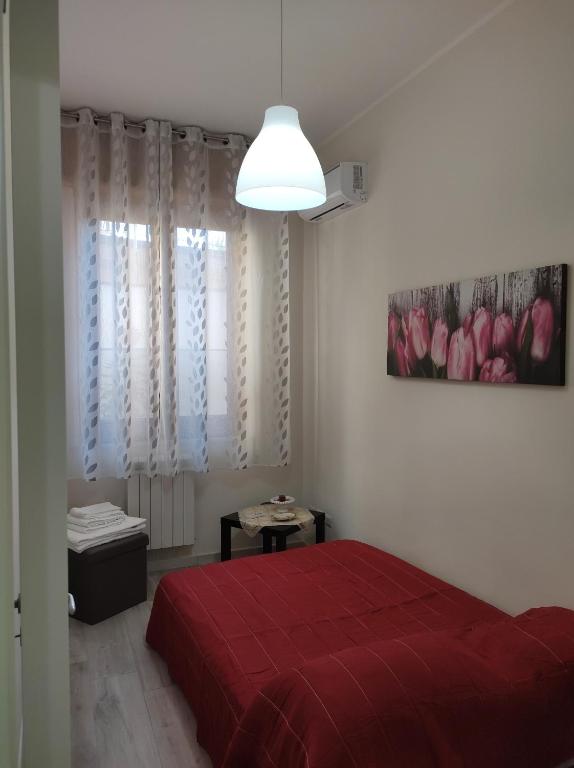 Postel nebo postele na pokoji v ubytování Casa Ninetta