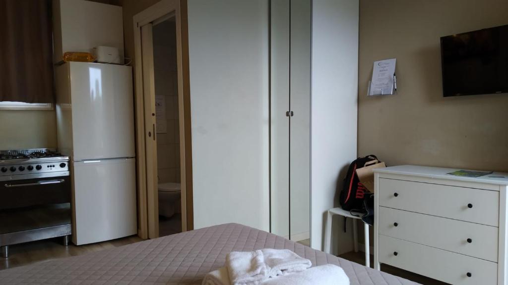 A bed or beds in a room at CconfortHotels R&B Cavour