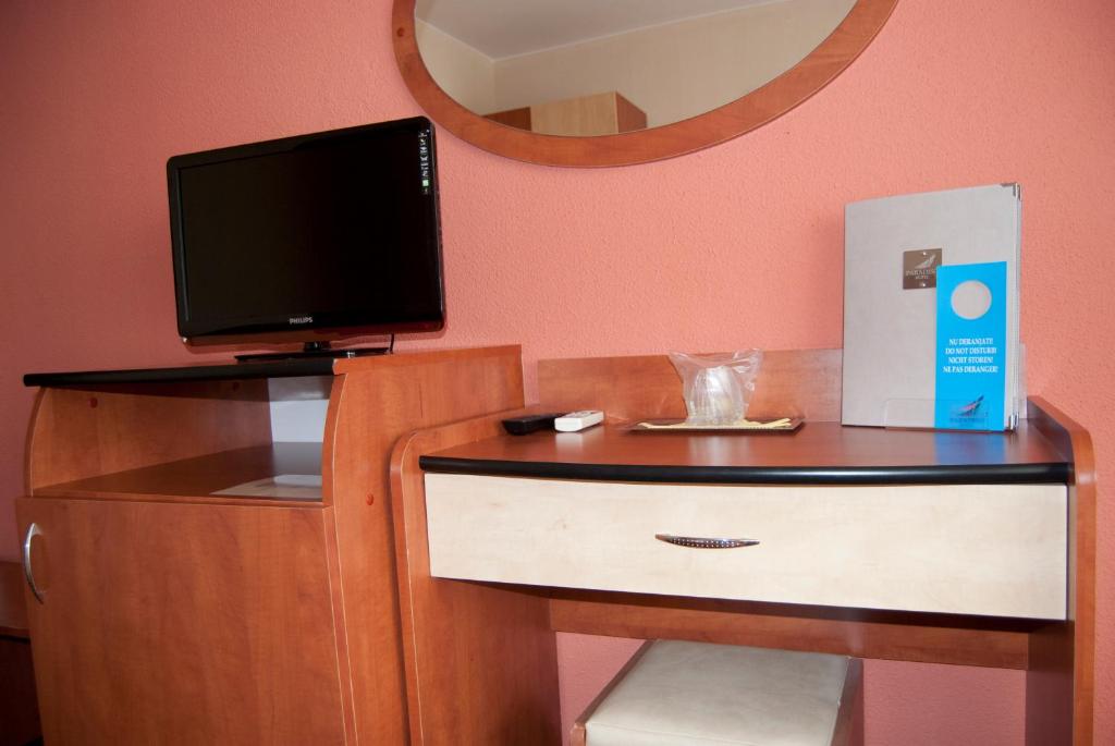 TV a/nebo společenská místnost v ubytování Hotel Paradiso