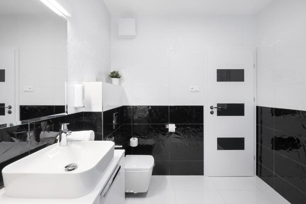 Kúpeľňa v ubytovaní Divat Apartments - Central Smart Homes