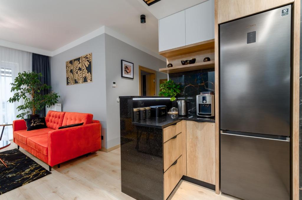 Kuchyň nebo kuchyňský kout v ubytování Apartament Eveline
