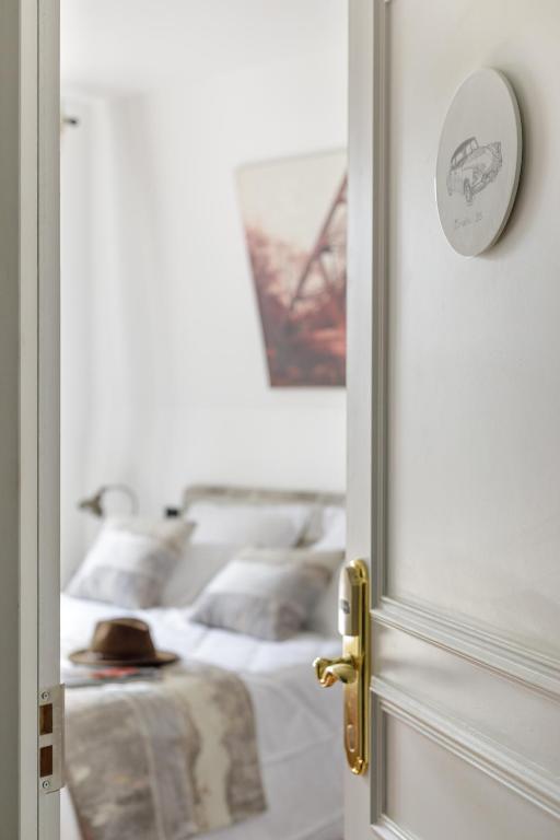 Postel nebo postele na pokoji v ubytování L'Hôtel Particulier - Paris Asnières