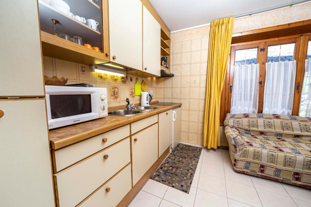 Kuchyňa alebo kuchynka v ubytovaní Chalet La Nuvola