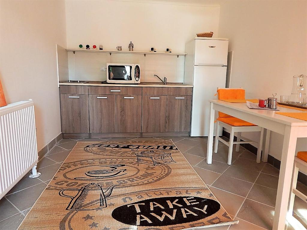 Kuchyň nebo kuchyňský kout v ubytování Bogácsa Apartman