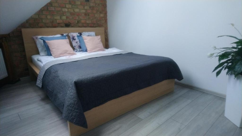 Posteľ alebo postele v izbe v ubytovaní Secret Apartament 2 Poznań