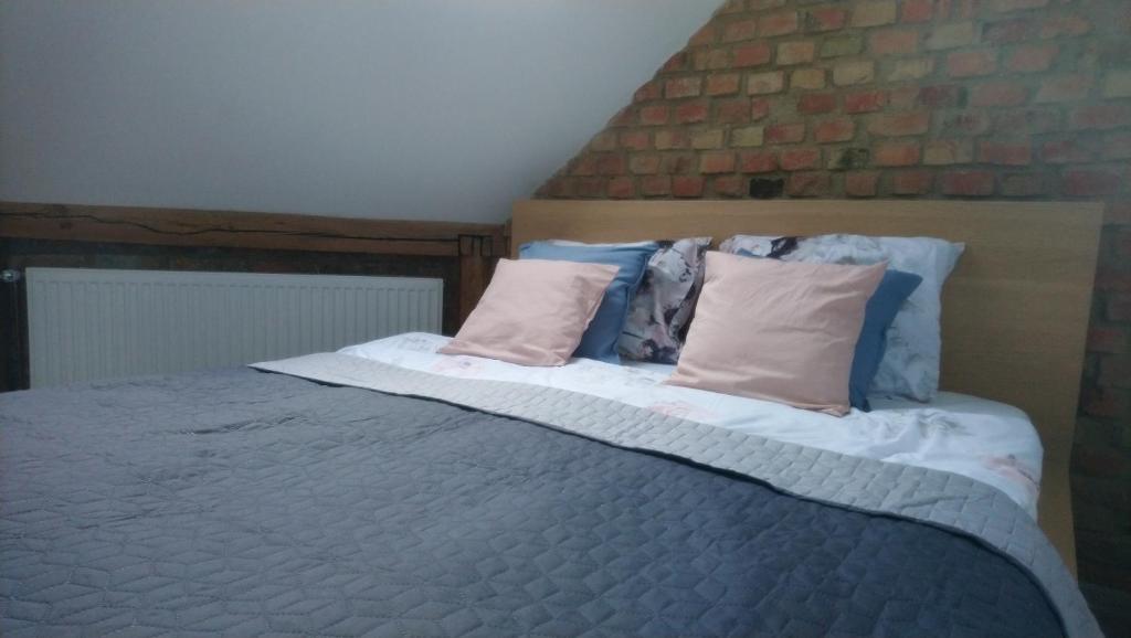 Posteľ alebo postele v izbe v ubytovaní Secret Apartament 2 Poznań