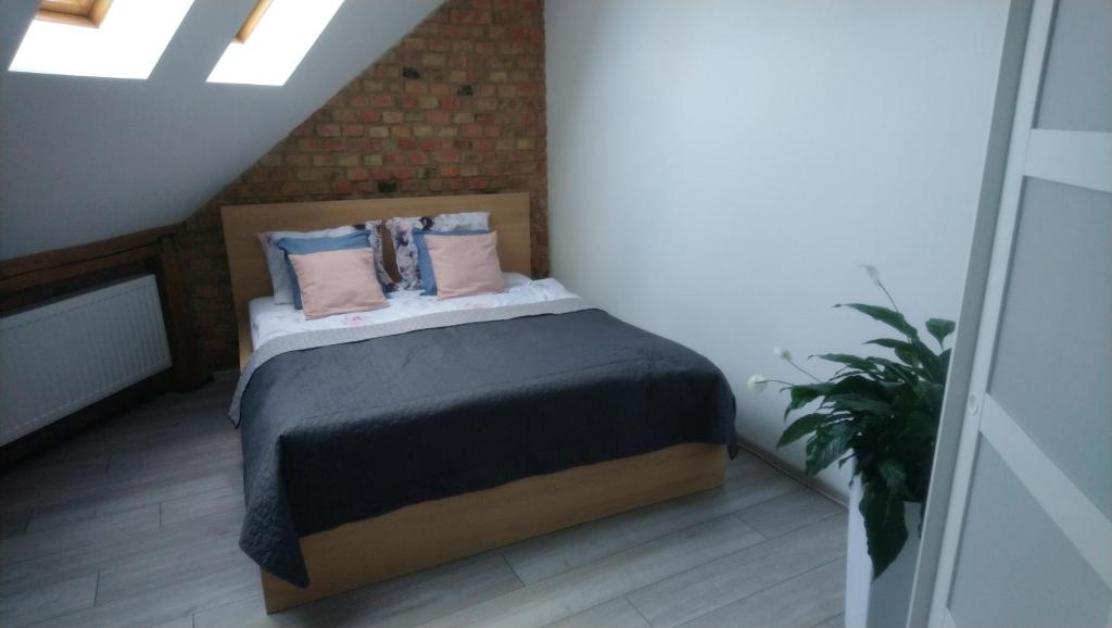 Posteľ alebo postele v izbe v ubytovaní Secret Apartament 2 Poznań