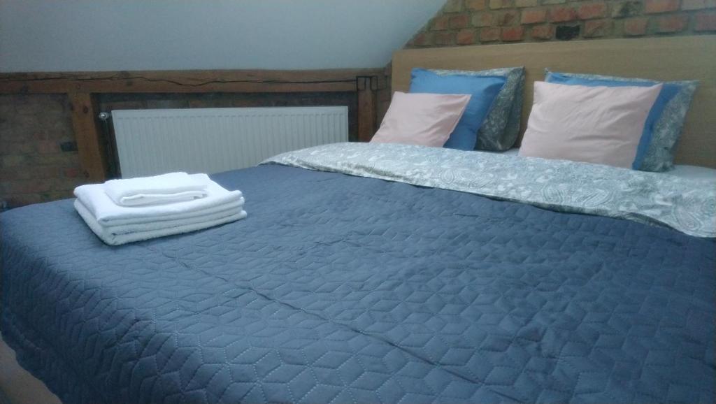 Posteľ alebo postele v izbe v ubytovaní Secret Apartament 2 Poznań