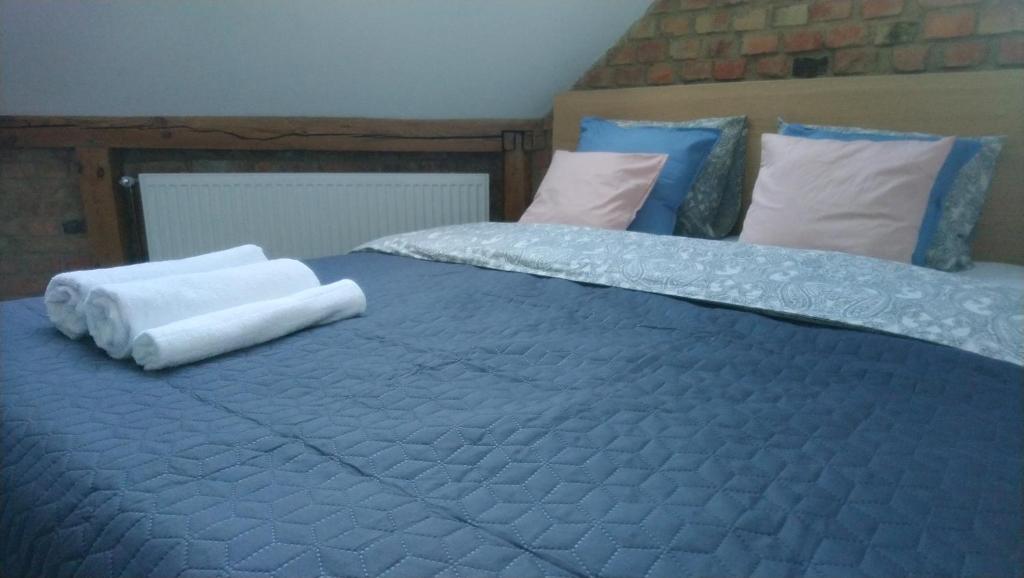 Posteľ alebo postele v izbe v ubytovaní Secret Apartament 2 Poznań