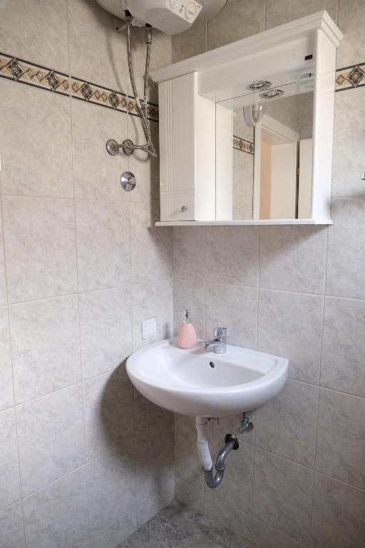 Koupelna v ubytování Apartments Jasmina