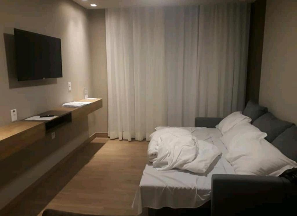 Postel nebo postele na pokoji v ubytování Laghetto Resort Golden Gramado