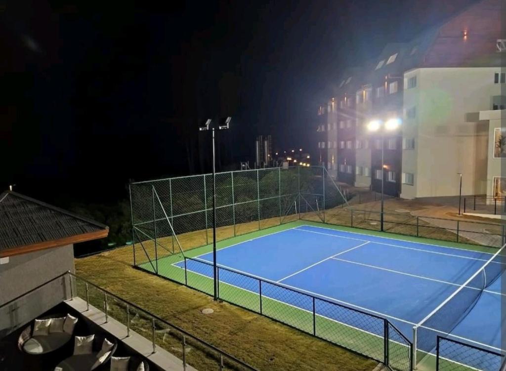 Tenis a/nebo squash v ubytování Laghetto Resort Golden Gramado nebo okolí