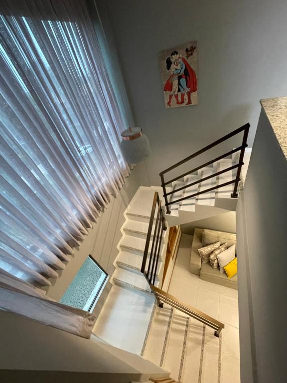 Postel nebo postele na pokoji v ubytování GUARAJUBA PARAÍSO DAS ÁGUAS - O ORIGINAL - são 12 APTS com 1, 2, e 3 quartos - PIONEIROS nesta plataforma desde 2016, OFERECEMOS CREDIBILIDADE - SE LIGA, temos o perfil com o maior número de avaliações positivas da região, seu PET é bem-vindo