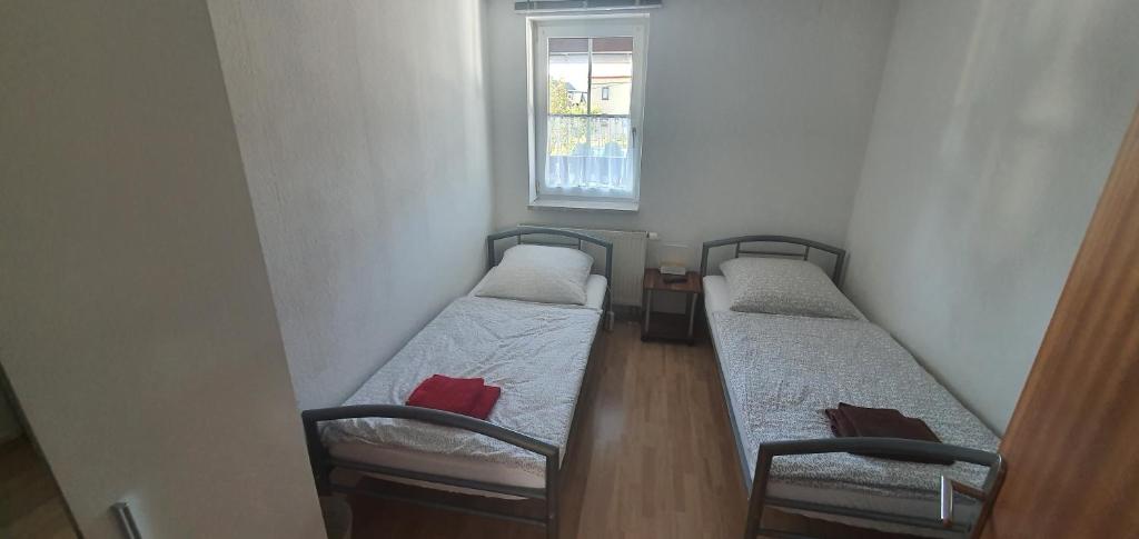 Postel nebo postele na pokoji v ubytování Apartment Marx