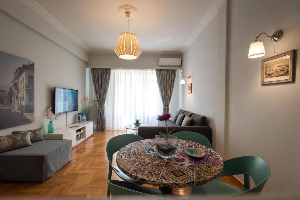 TV a/nebo společenská místnost v ubytování Blue Ark Acropolis Light