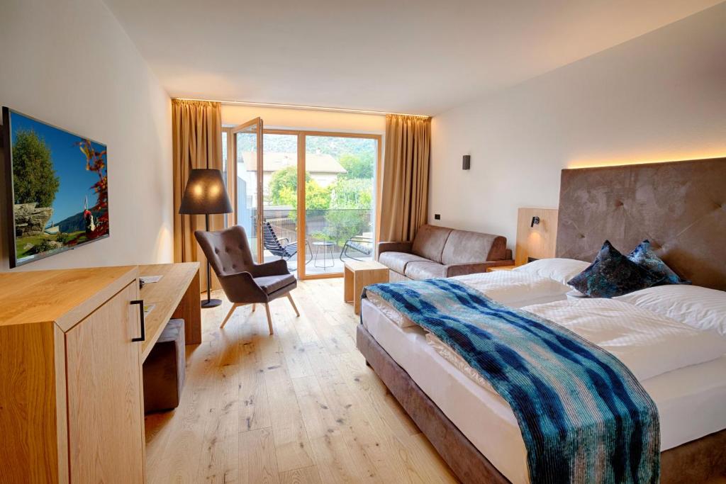 Postel nebo postele na pokoji v ubytování Genusshotel Diamant