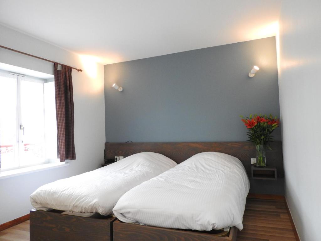 Postel nebo postele na pokoji v ubytování Au Bon Gîte