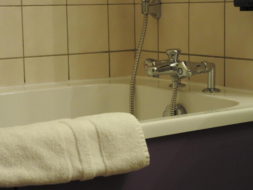 Koupelna v ubytování Au Bon Gîte