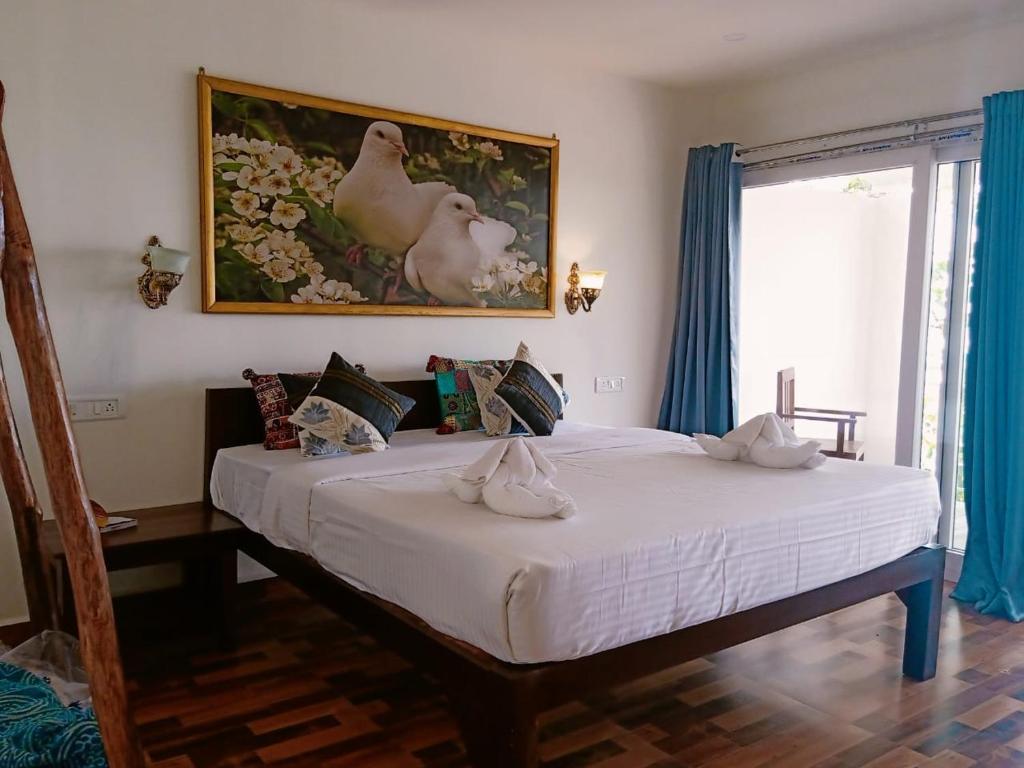 Postel nebo postele na pokoji v ubytování Chique Shanti Resort