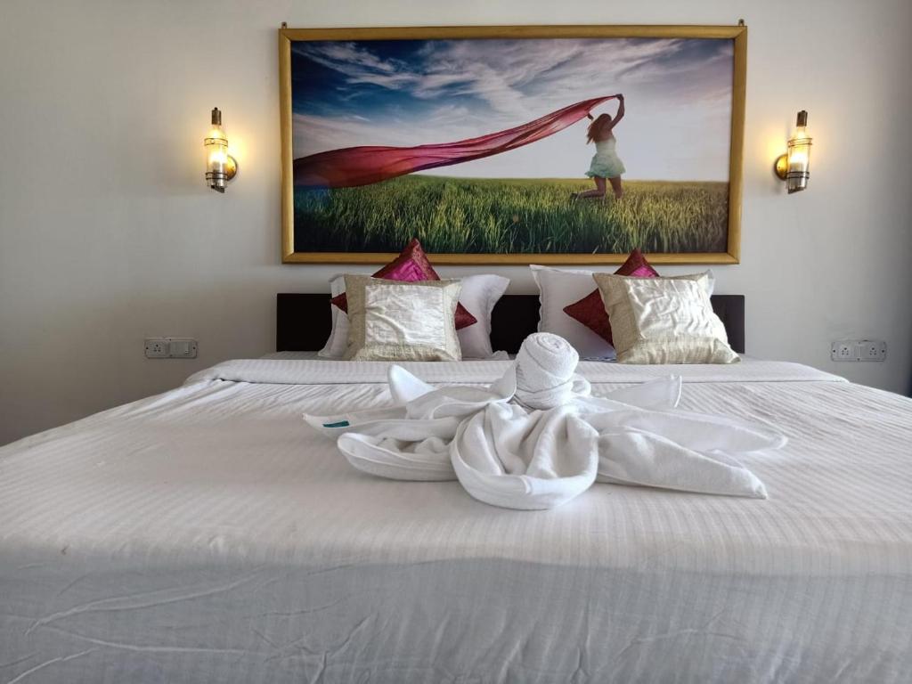 Postel nebo postele na pokoji v ubytování Chique Shanti Resort