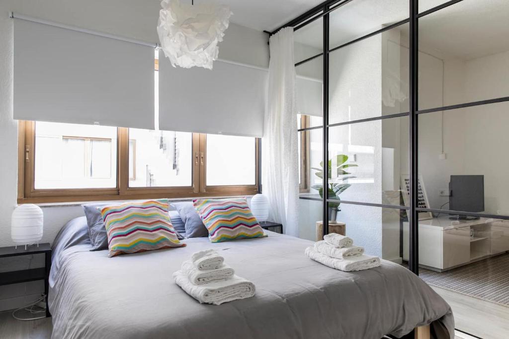Posteľ alebo postele v izbe v ubytovaní Loft en el corazón de Valencia