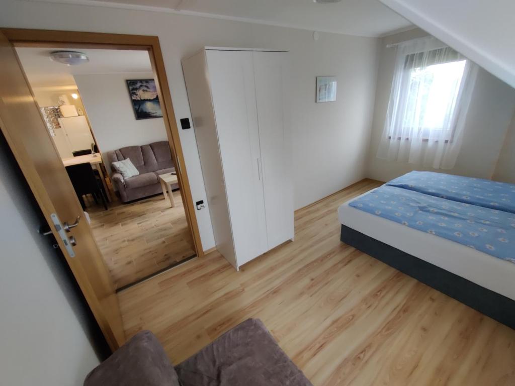 Postel nebo postele na pokoji v ubytování Bertalan Apartman