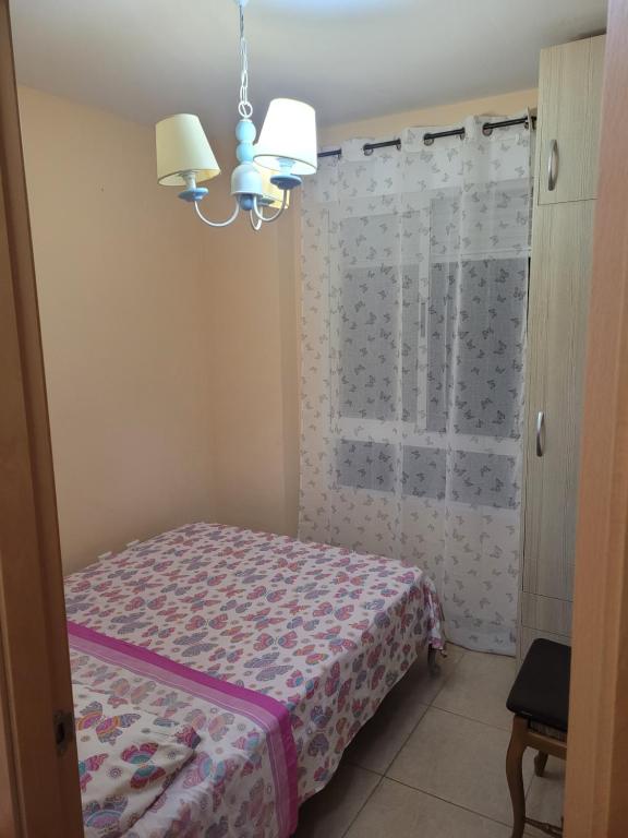 Postel nebo postele na pokoji v ubytování Apartamento vacacional Adriana , Montanejos