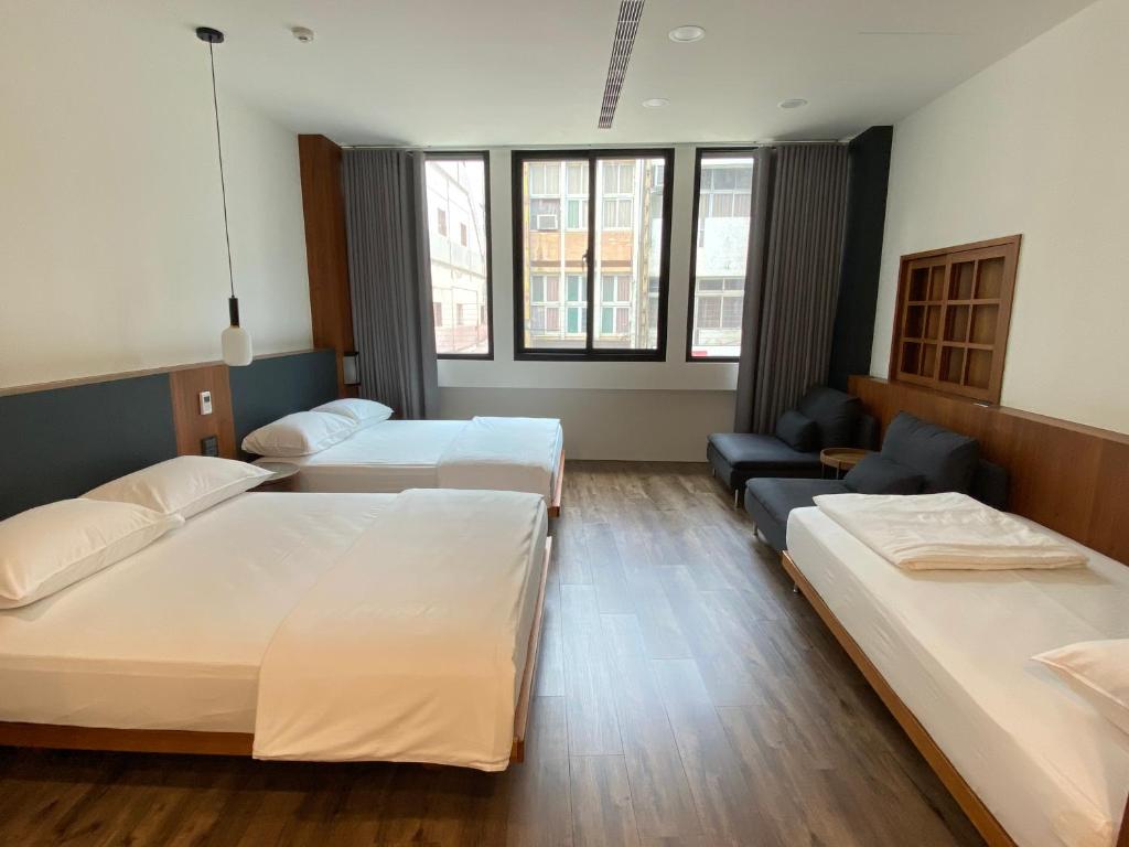 Postel nebo postele na pokoji v ubytování De Provintia Straat B&B