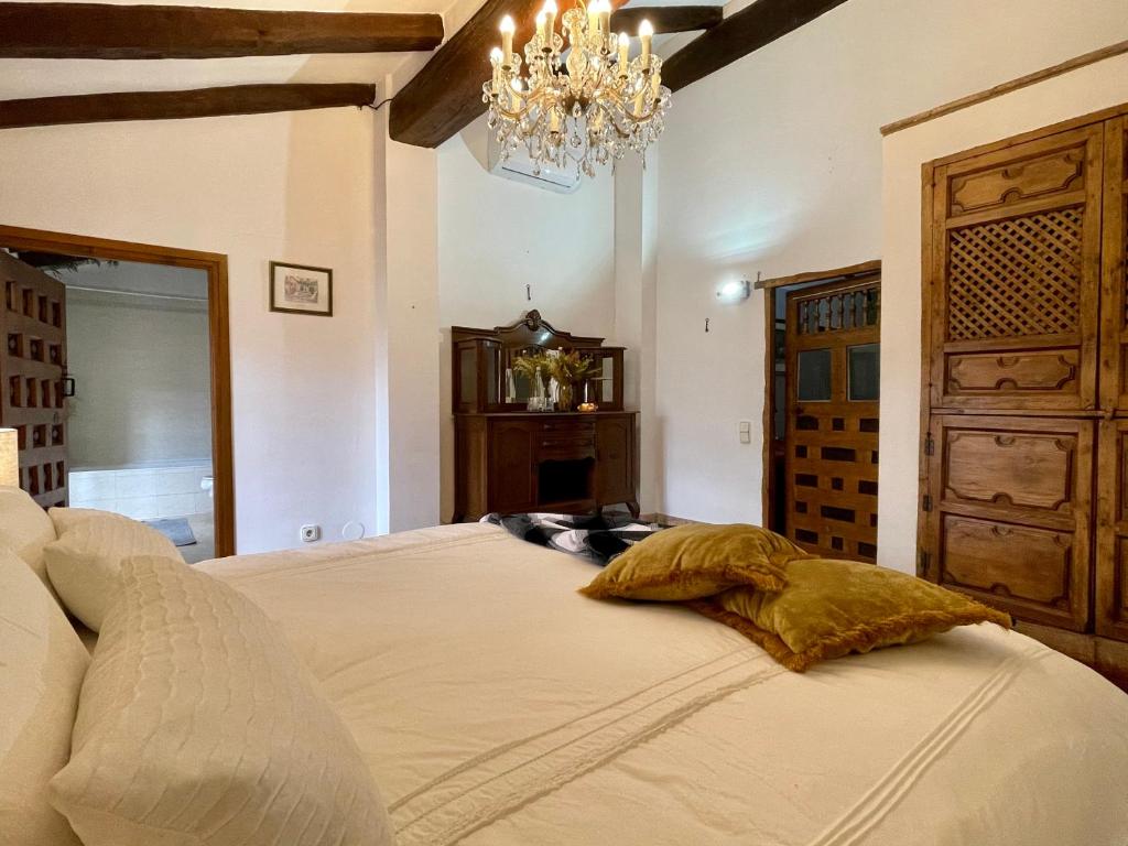 Postel nebo postele na pokoji v ubytování Barri Antic Cambrils