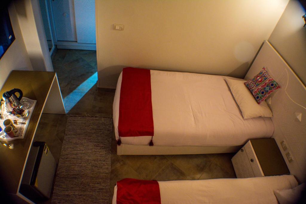Uma cama ou camas num quarto em NUB INN