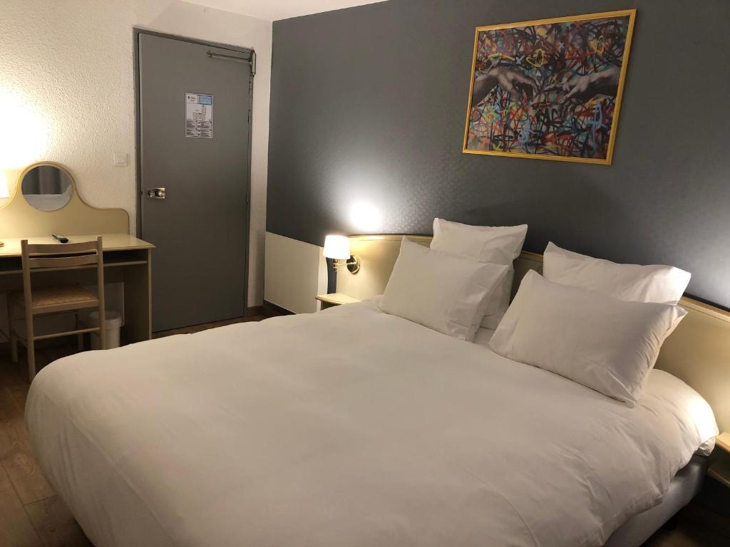 Postel nebo postele na pokoji v ubytování Grand Hôtel d'Espagne