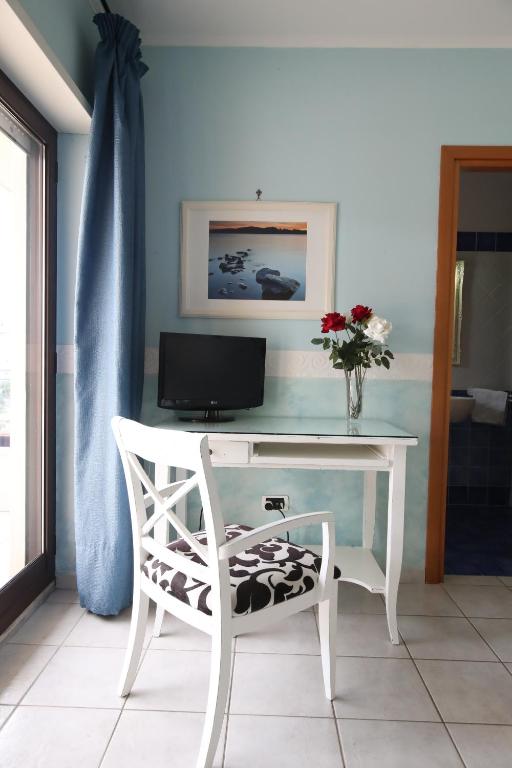 TV a/nebo společenská místnost v ubytování Le Terrazze B&B