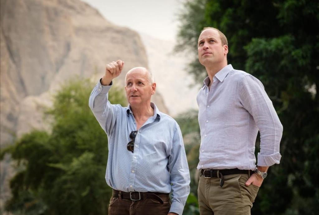 two men are standing next to each other at Wadi Al Arbeieen Resort in Muscat
