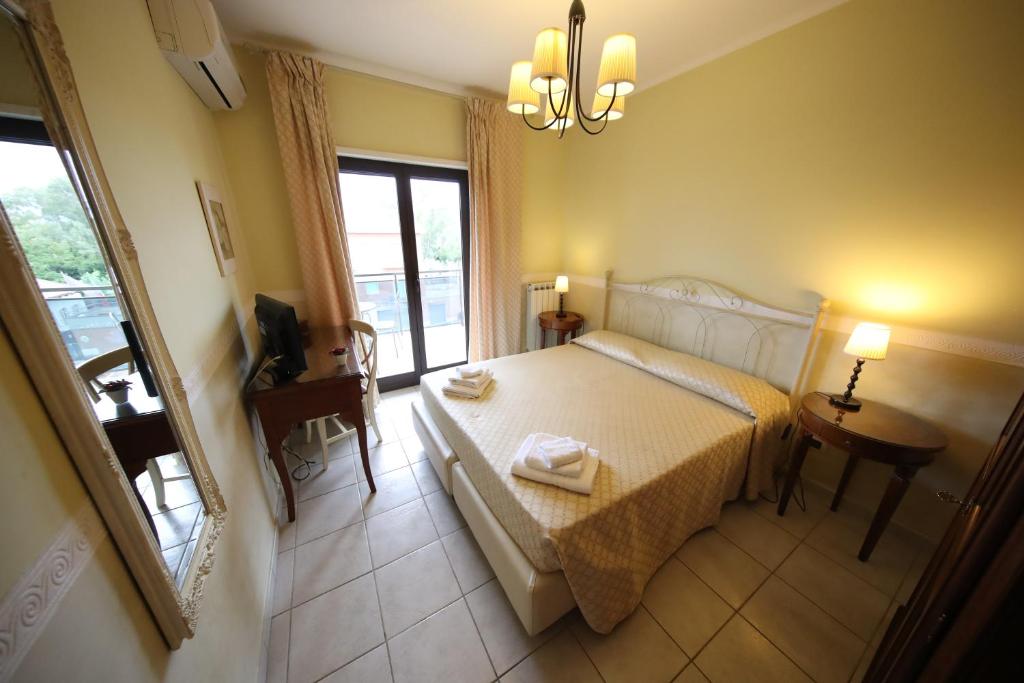 Postel nebo postele na pokoji v ubytování Le Terrazze B&B