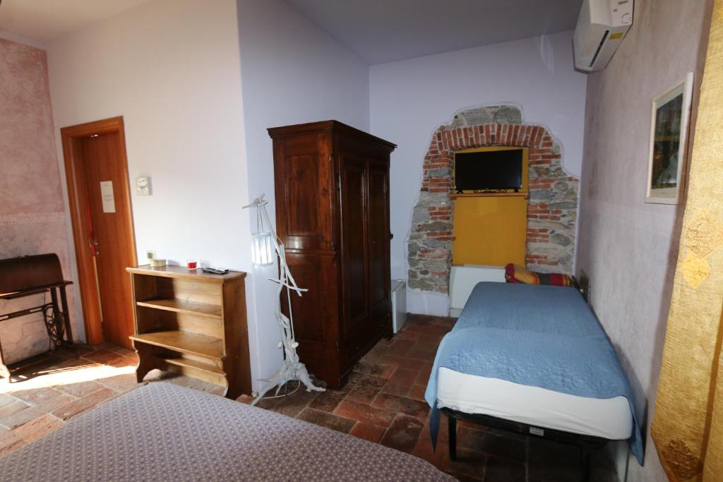 Posteľ alebo postele v izbe v ubytovaní B&B Coco Loco