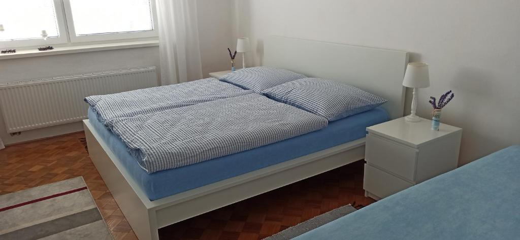Postel nebo postele na pokoji v ubytování Ubytování U Zastávky