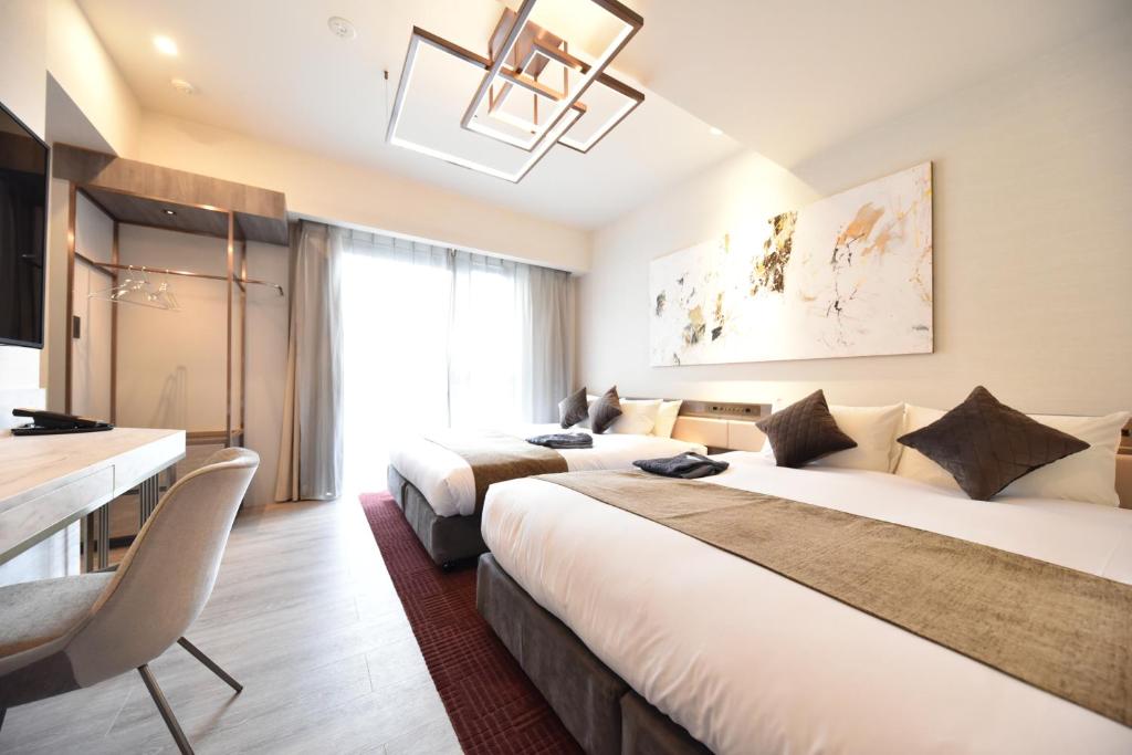 Hotel Cordia Osaka Hommachi房間的床