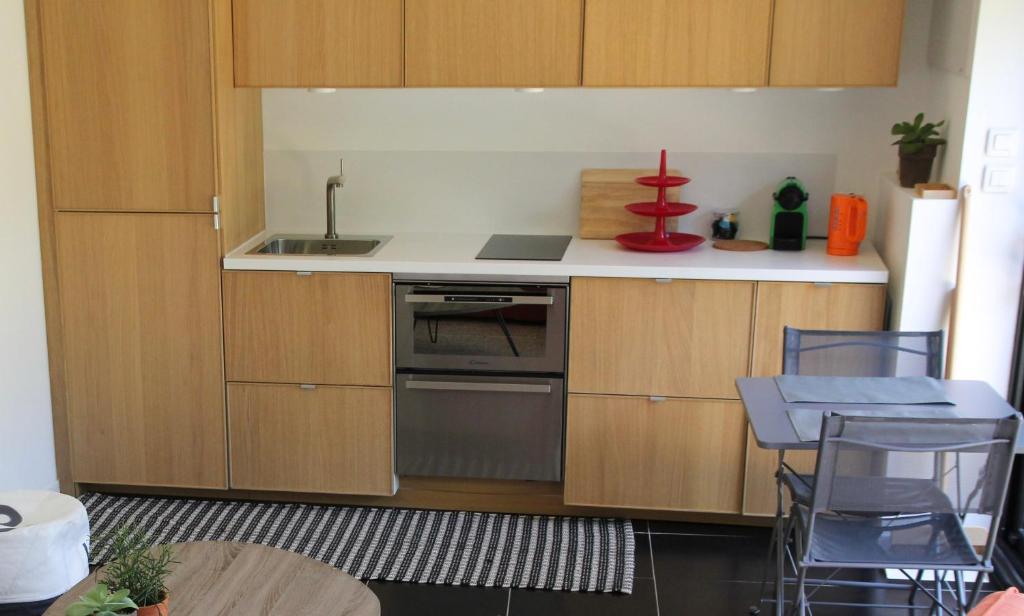 Kuchyň nebo kuchyňský kout v ubytování TinyHouse LE CONQUET