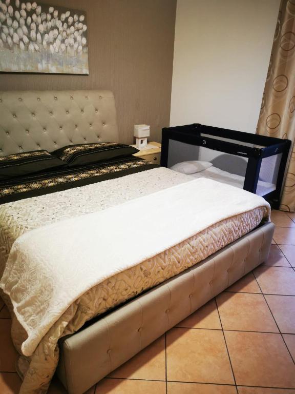 Posteľ alebo postele v izbe v ubytovaní Casa Donna Rosaria tra Etna e Taormina