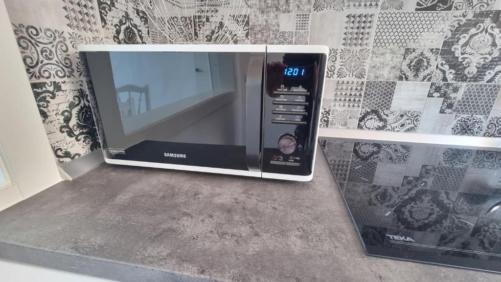 Kuchyň nebo kuchyňský kout v ubytování Santiago Astalavista sea view 4