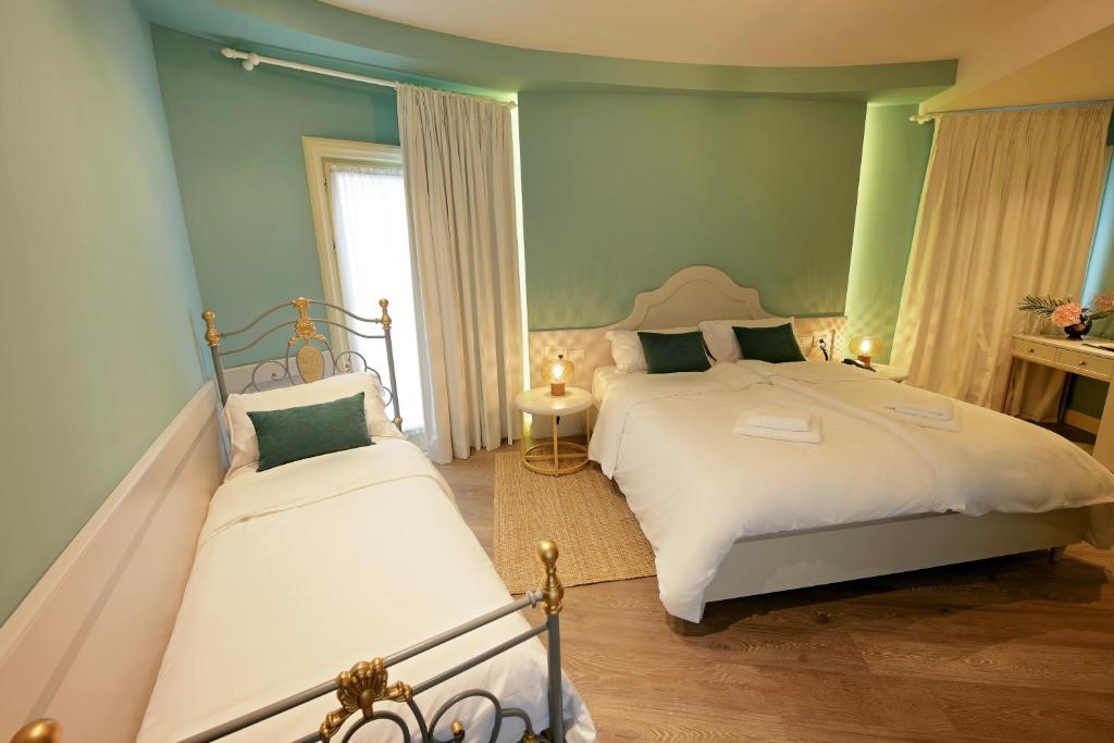 Postel nebo postele na pokoji v ubytování Çoçja Boutique Hotel